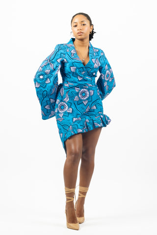african print co ord consisting of a blazer and skirt with asymmetrical design, made from floral light blue african wax fabric