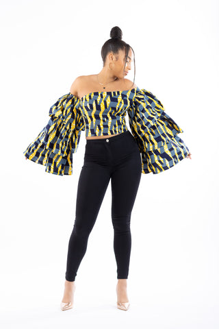 vibrant and playful ankara top with dramatic flared sleeves and unique neckline 