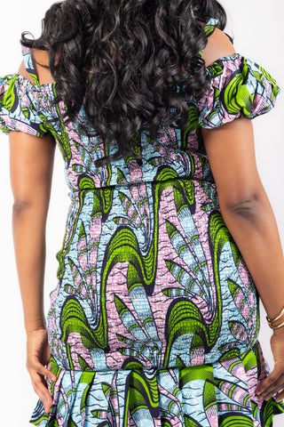 back view of african print mini dress smocked design