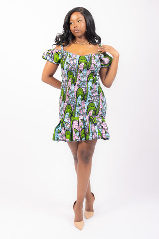 african print knee-length dress with pleated hem